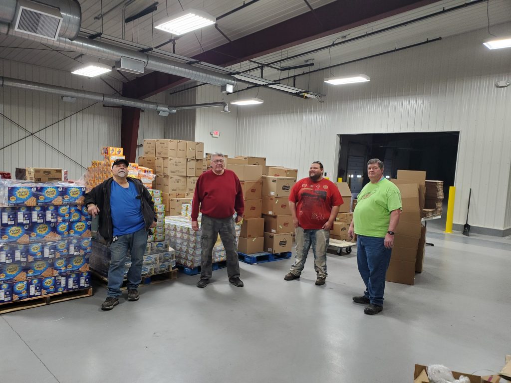 White Earth Transit drivers organize food for a food drive