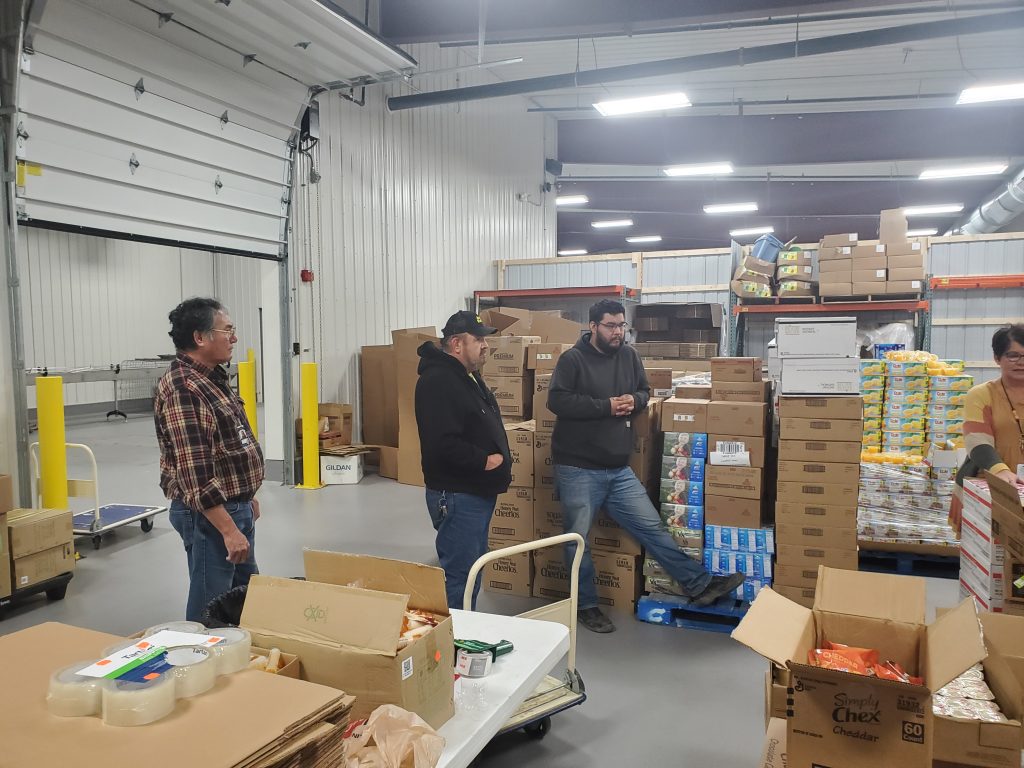 White Earth Transit drivers organize food for a food drive