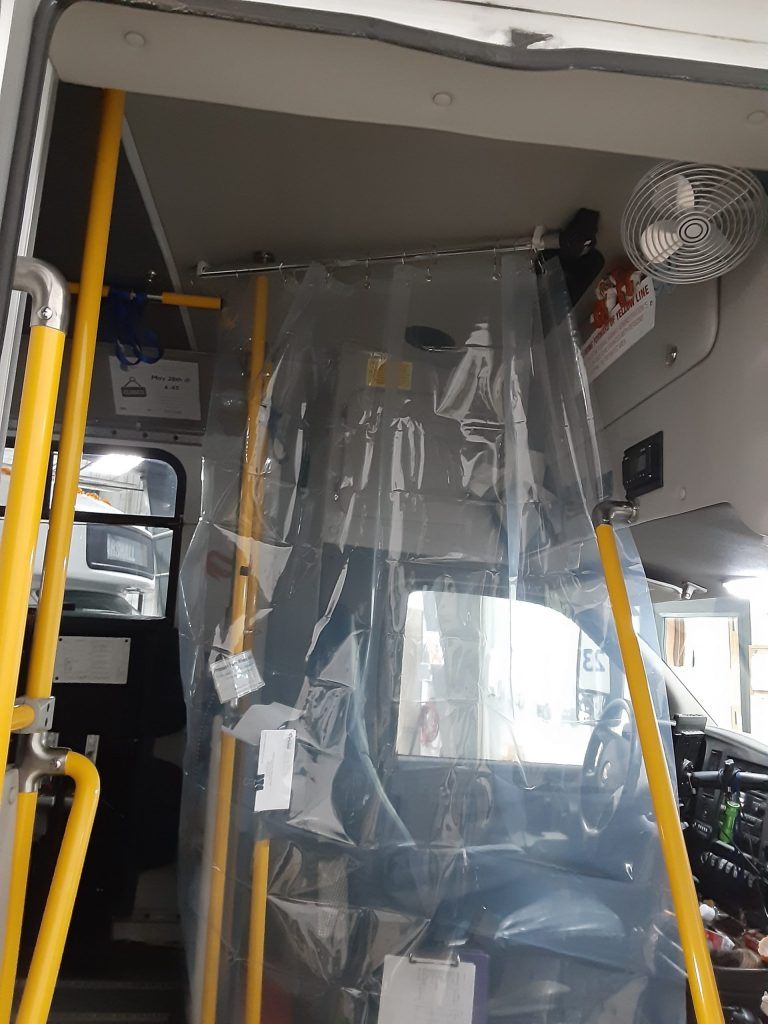 image of a driver barrier on a United Community Action Partnership bus
